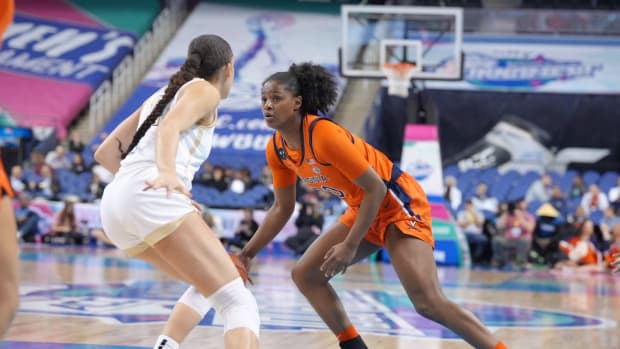 Camryn Taylor handles the ball during the Virginia women's basketball game against Wake Forest in the first round of the 2023 ACC Women's Basketball Tournament at Greensboro Coliseum.